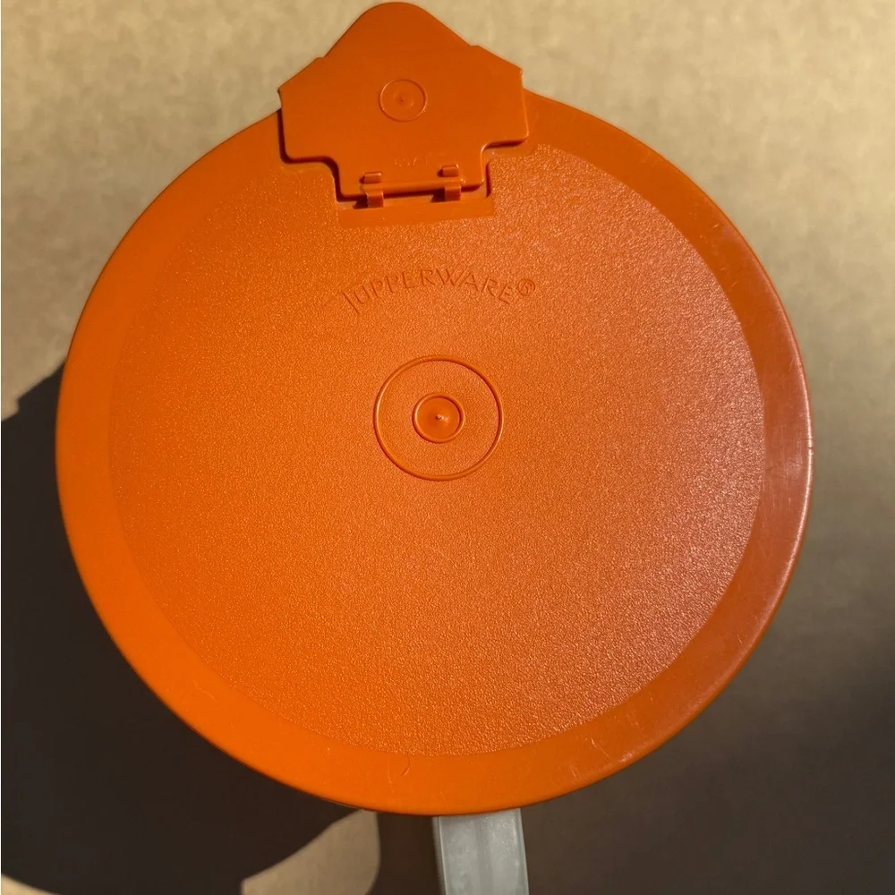 Vintage Tupperware Orange Lidded Measuring Cup